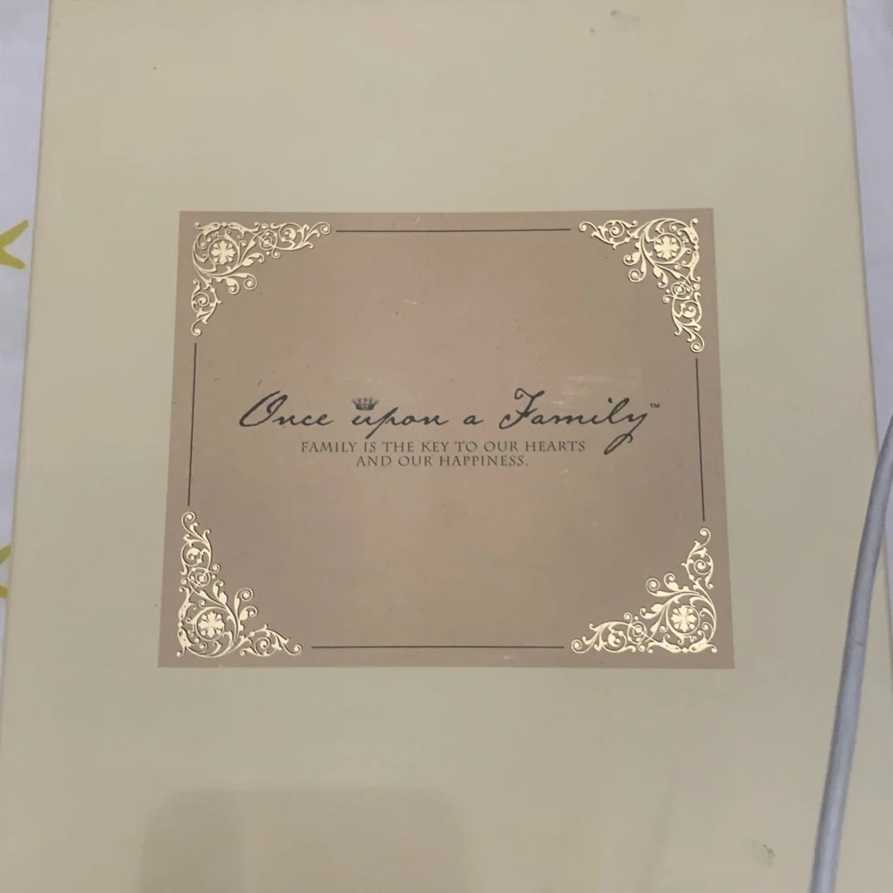 Family Recipes Cookbook with Black, White, and Cream Cover